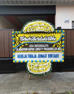 Papan Bunga Duka di Olibu