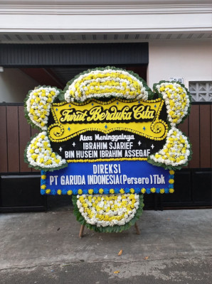 Papan Bunga Duka di Olibu